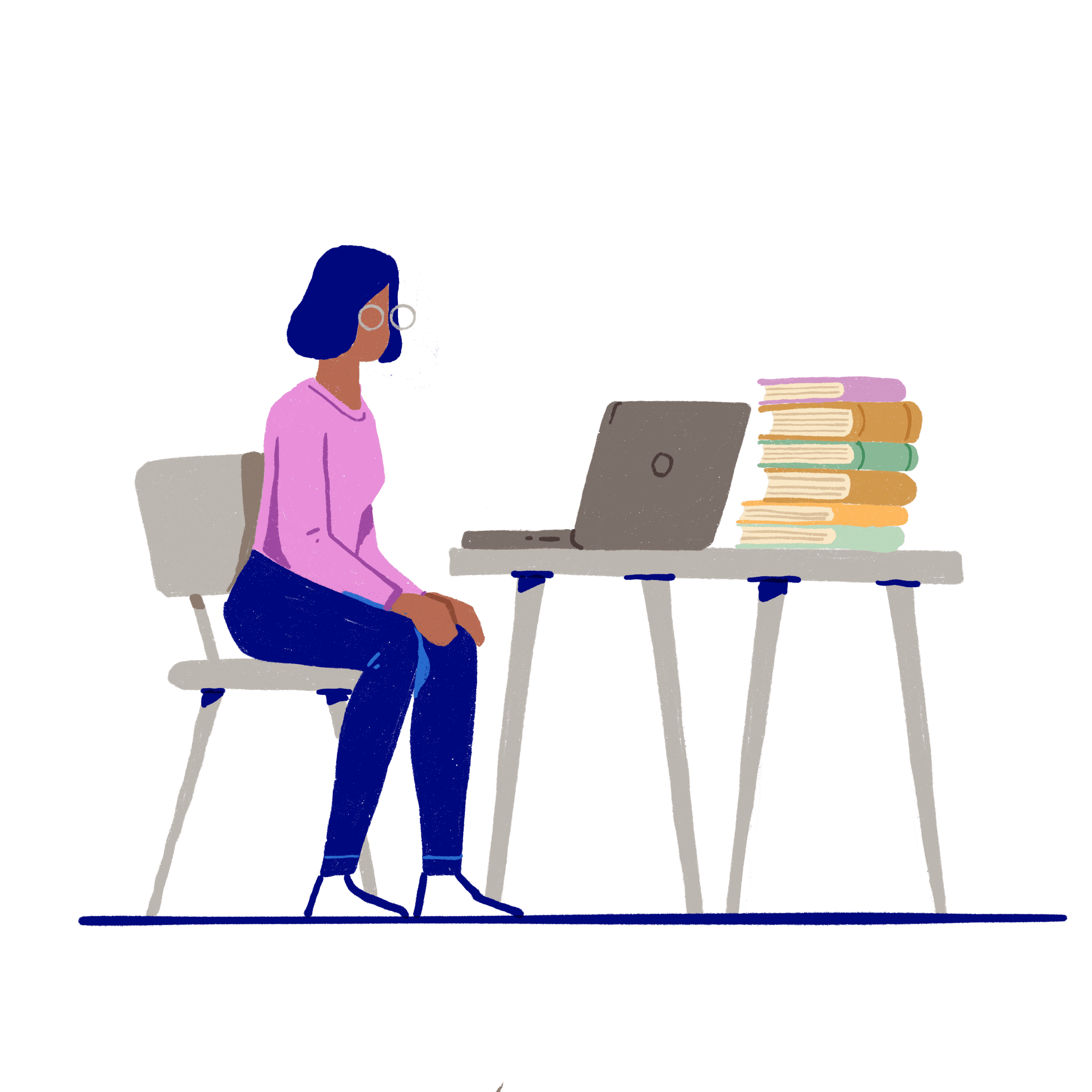 Student studying, sitting at a desk with laptop and a pile of books